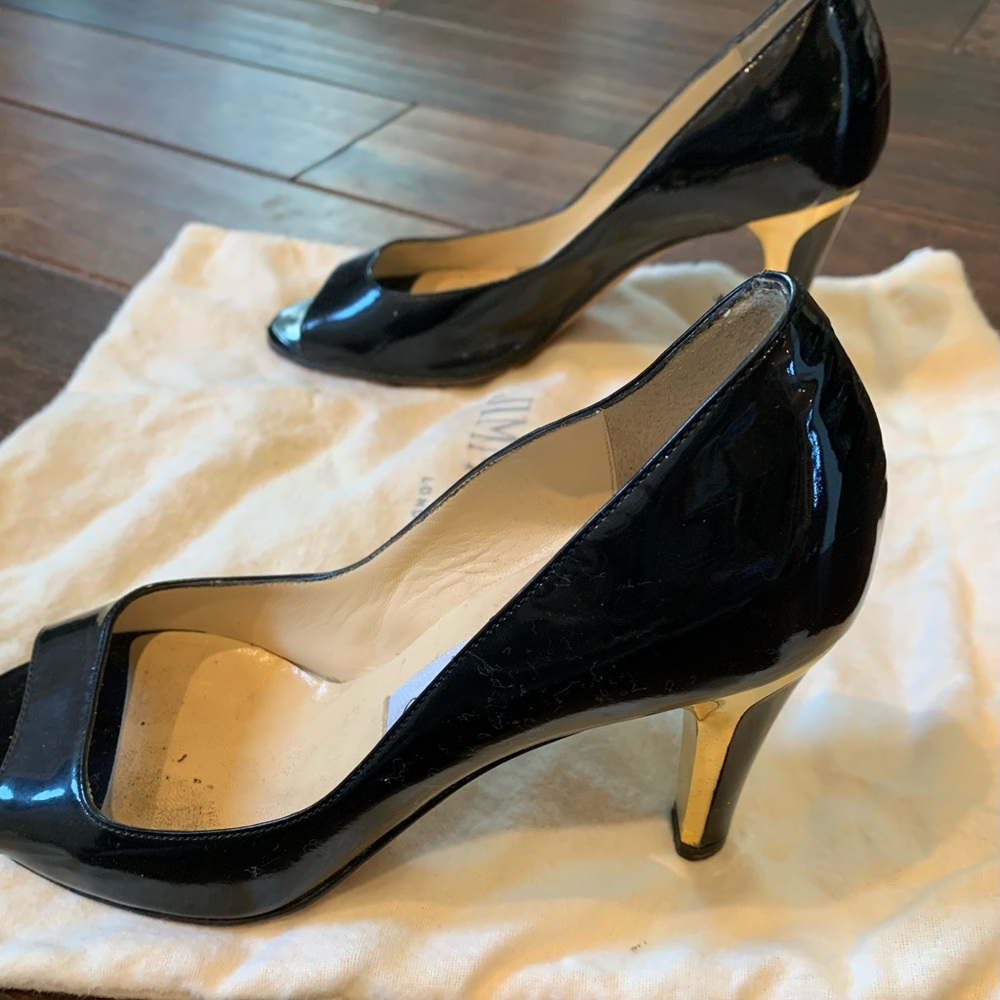 Jimmy Choo black patent leather pumps with gold heel. Elegant!